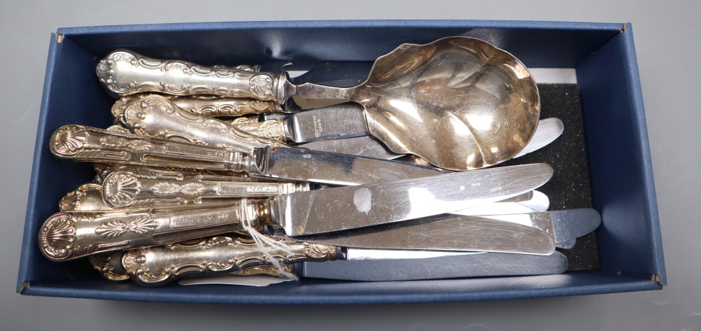 Twelve 20th century Birks sterling handled knives and a cheese knife and server and three other silver handled knives.